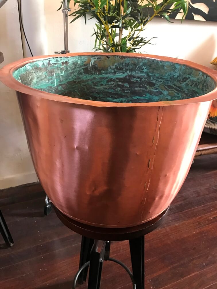 A large laundry copper pot which has been restored